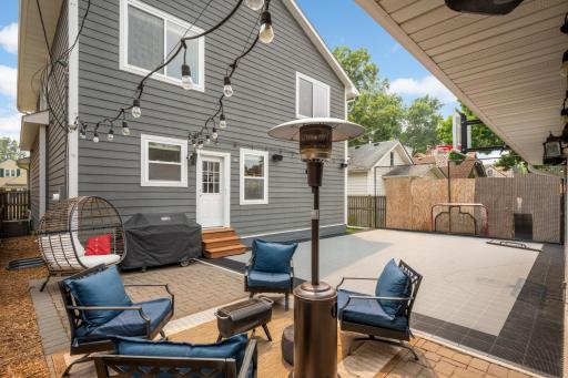 Backyard with sport court and patio