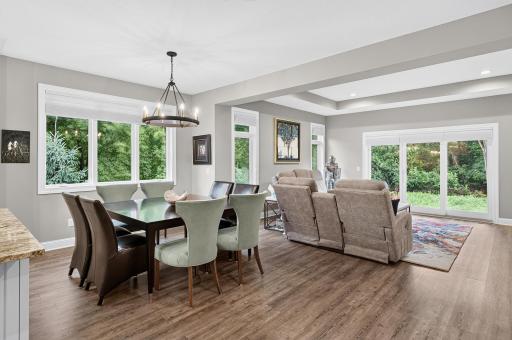 Lovely dining area - greenery surrounds the home from all windows...