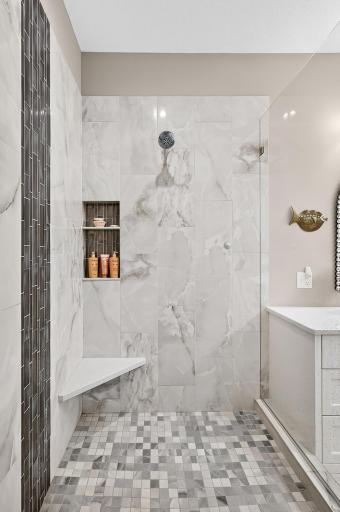 No step, walk-in shower is very spacious...