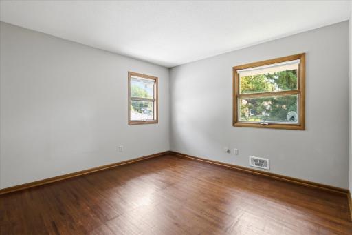Upstairs, you'll find all of the home's bedrooms, each offering hardwood floors, generous natural light, and comfortable layouts designed for restful everyday living.