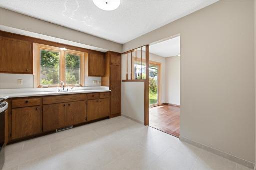 Conveniently connected to the dining room, the kitchen creates an easy flow for everyday meals, holiday gatherings, and entertaining family and friends.