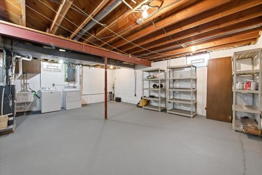 The spacious lower level includes the laundry area, mechanical systems, and abundant storage space, complemented by numerous updates including newer HVAC, plumbing improvements, added insulation, and more.