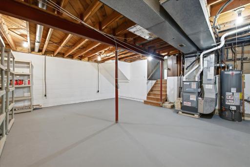The unfinished basement provides exceptional storage and endless potential for future expansion, workshop space, fitness equipment, or additional finished living area.