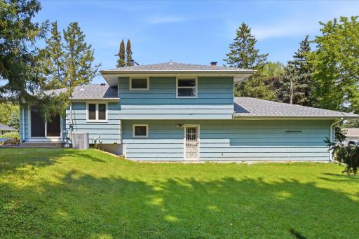 The expansive backyard provides a generous outdoor space for recreation, gardening, or entertaining.