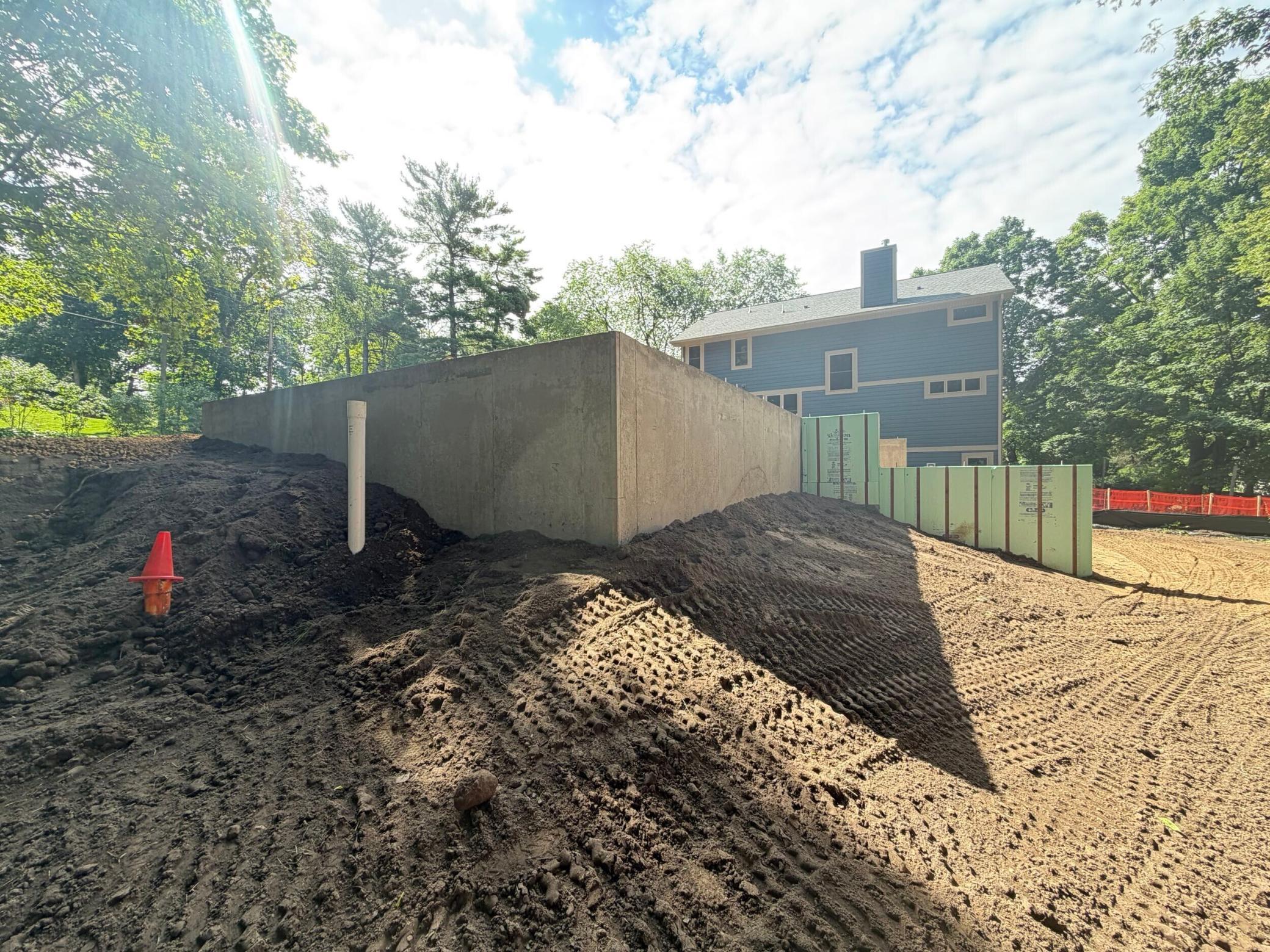 View of new foundation from the backyard looking south