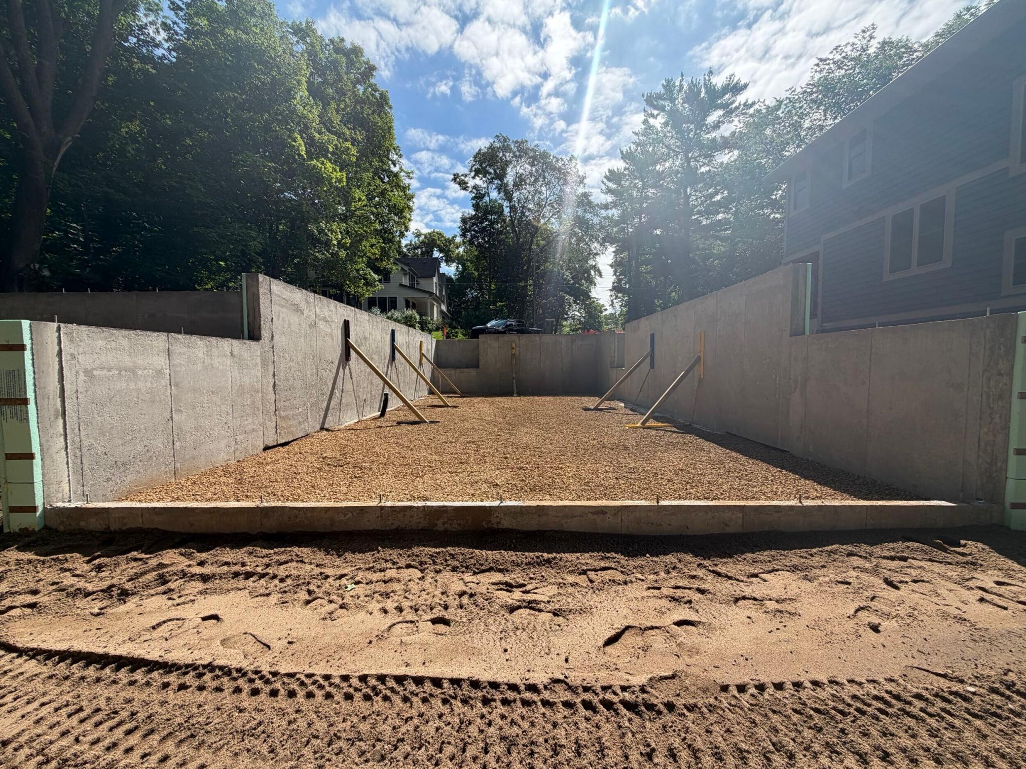 View of new foundation from the backyard looking east