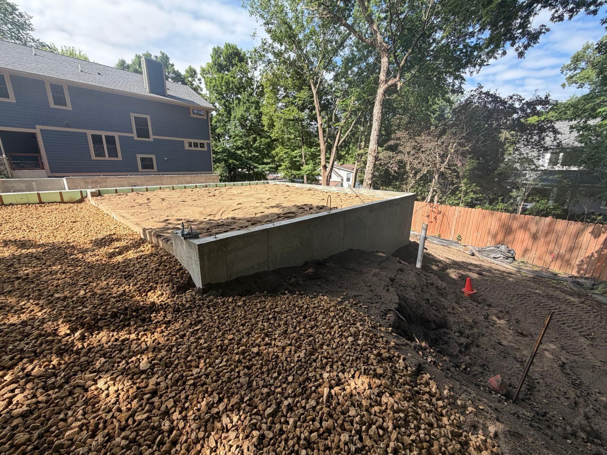 View of new foundation from the street looking southwest