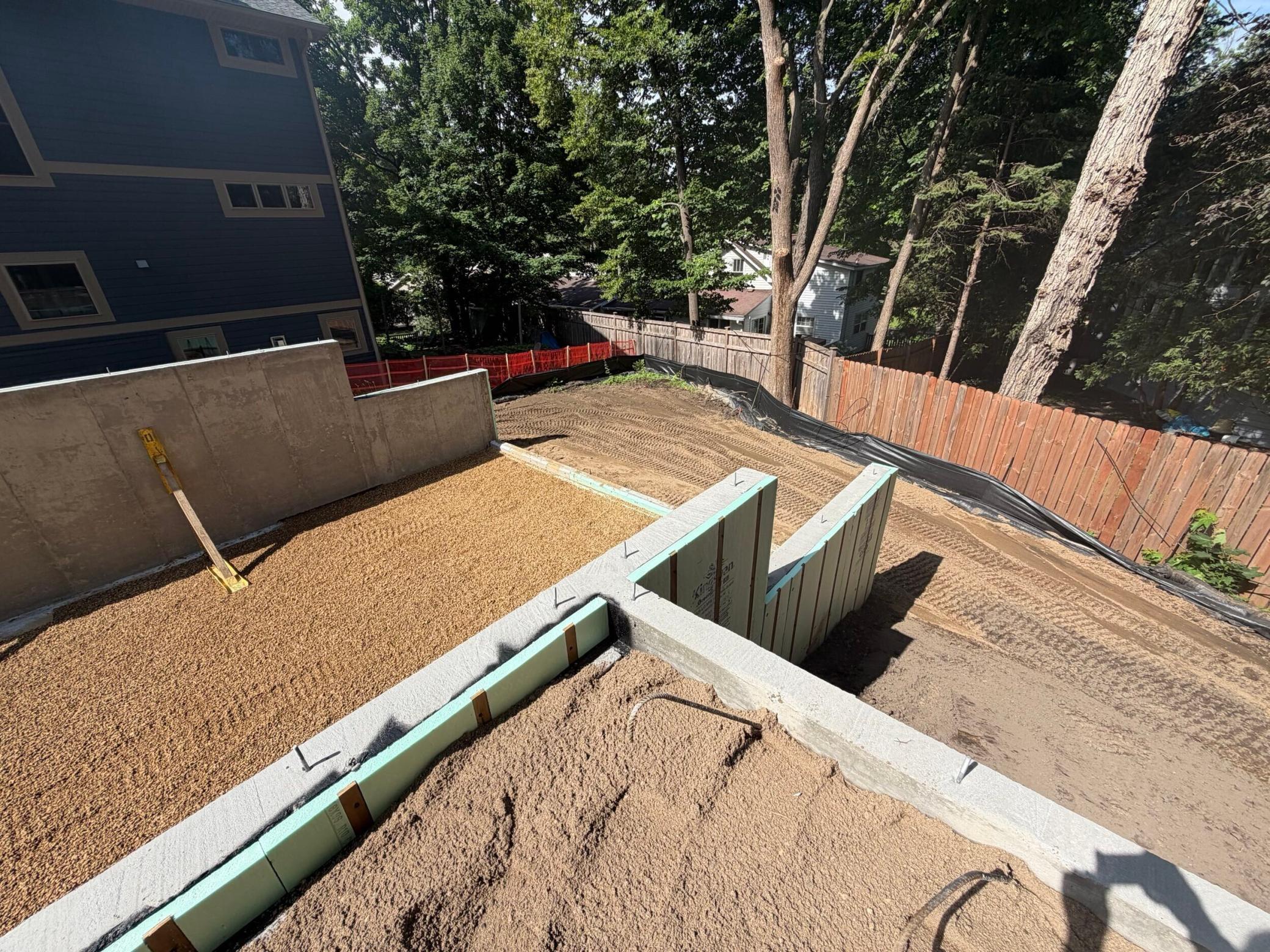 View of the basement foundation and backyard looking west