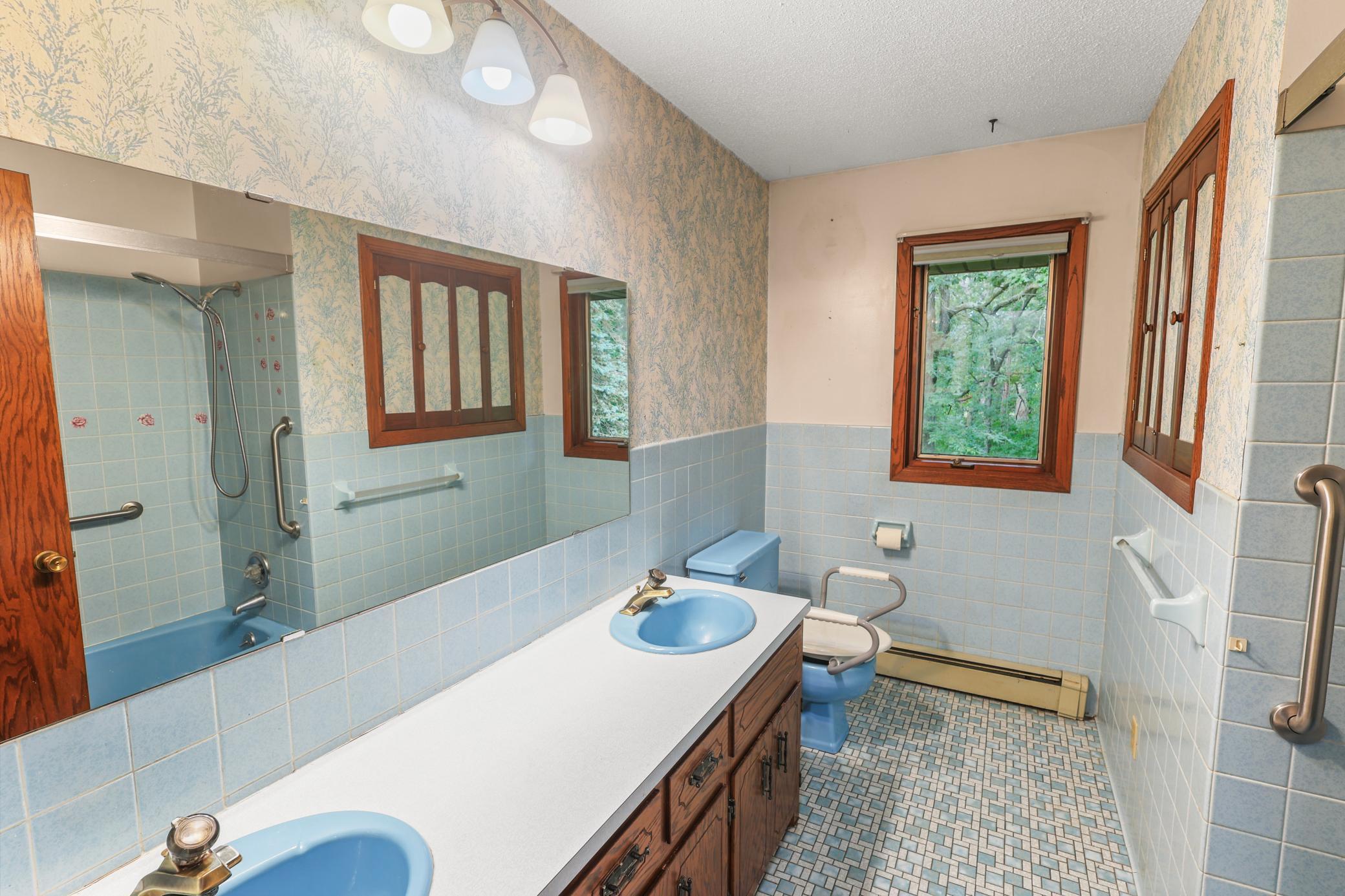 Large full bathroom is retro, but in great condition