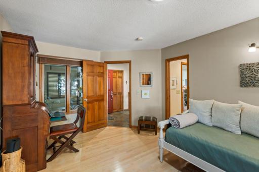 The main floor Bedroom is adjacent to a custom bath can be function as a Primary Bedroom