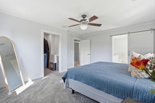Primary bedroom walk-in closet and ensuite