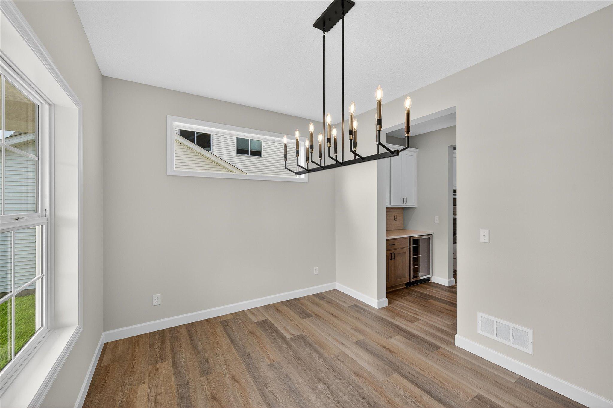 Formal Dining Room- photo is of a previous inventory home. Inquire for more details and options.