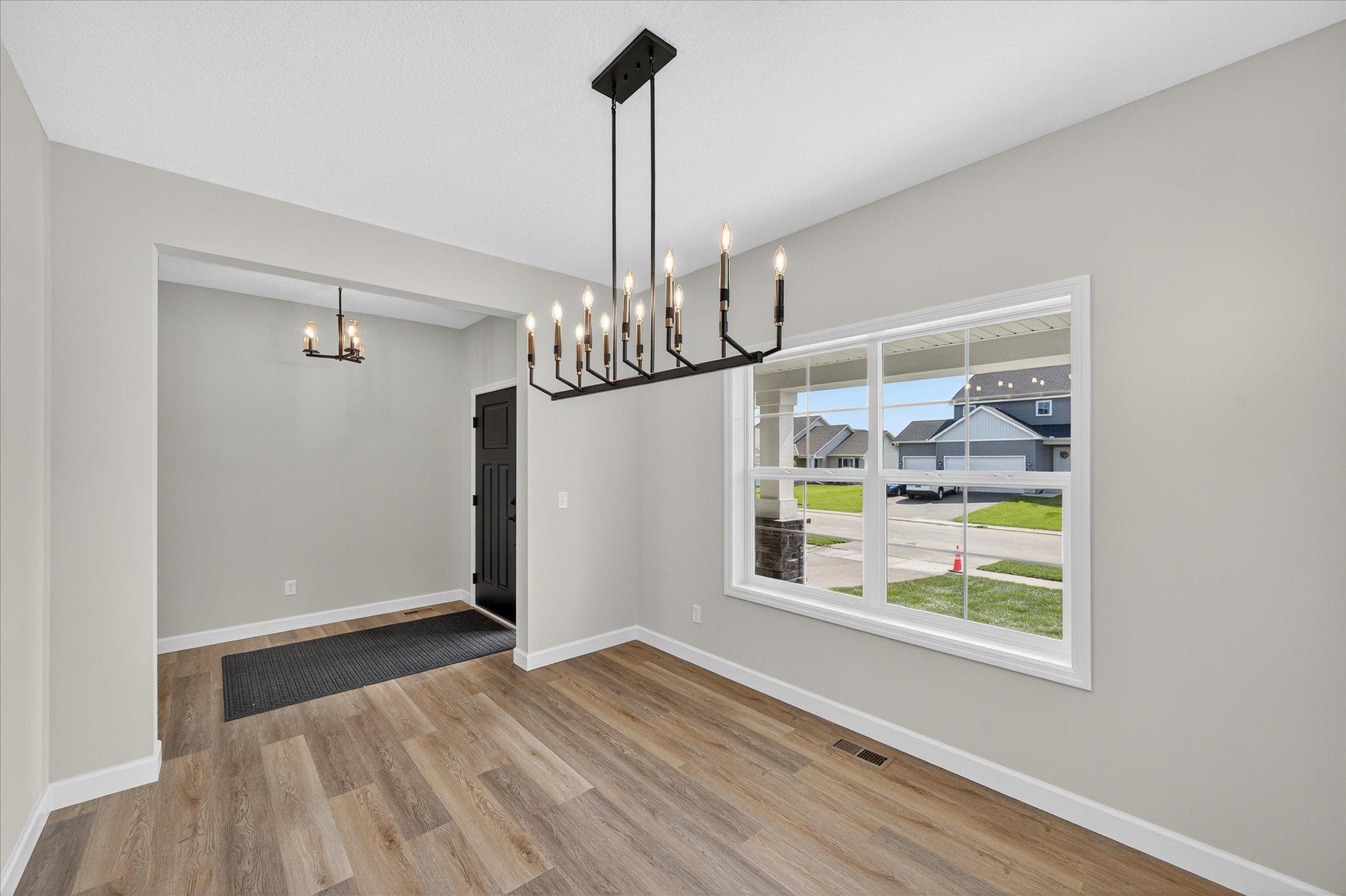 Formal Dining Room - photo is of a previous inventory home. Inquire for more details and options.