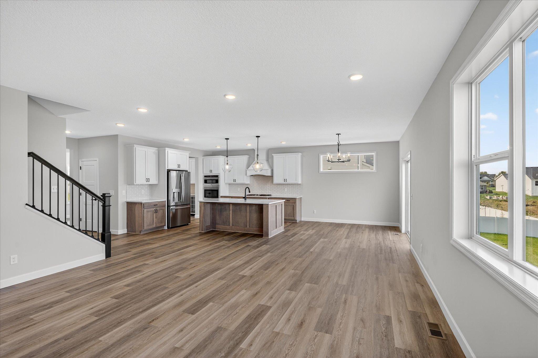 Living Room - photo is of a previous inventory home. Inquire for more details and options.
