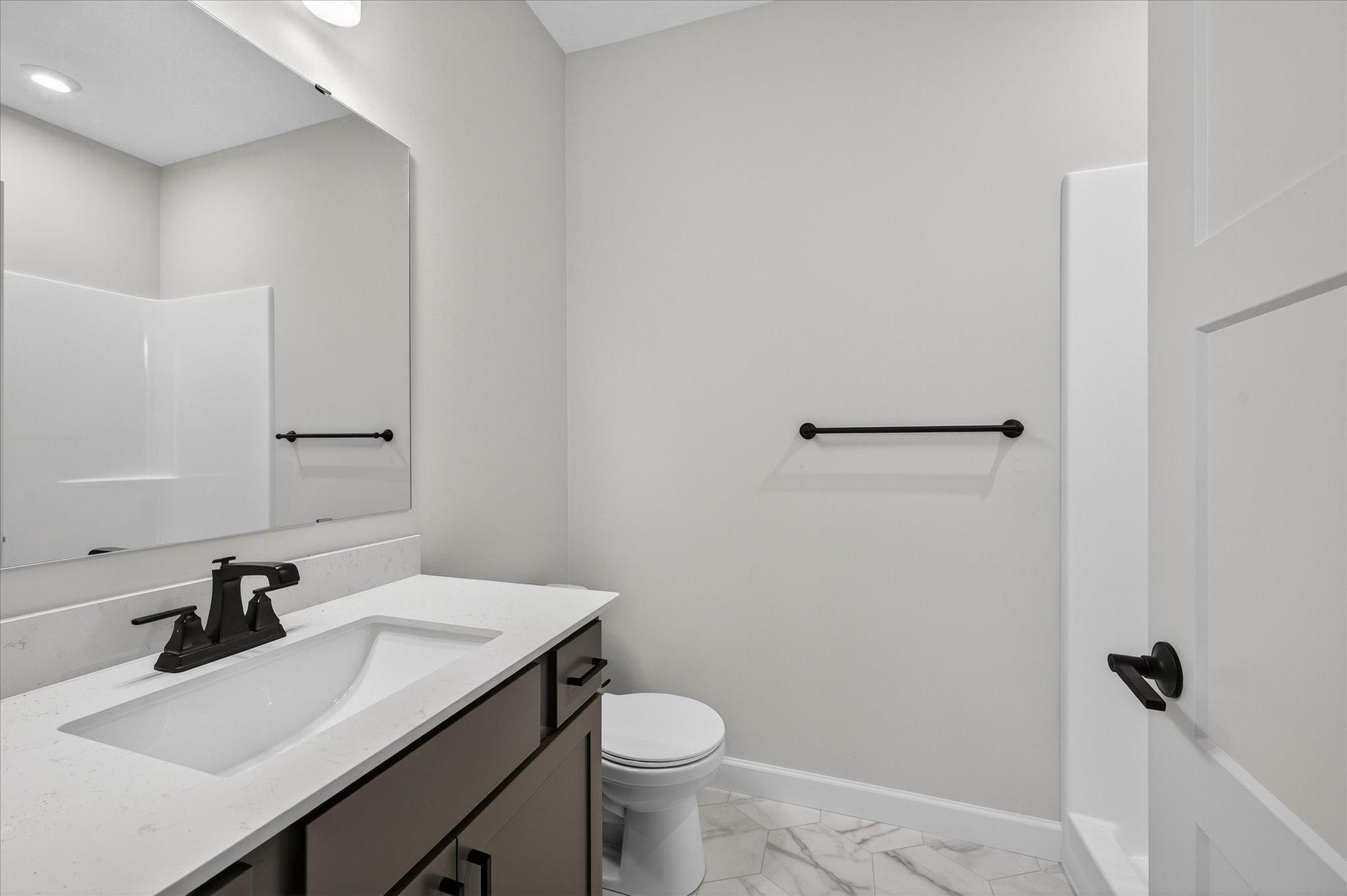 Bathroom - photo is of a previous inventory home. Inquire for more details and options.