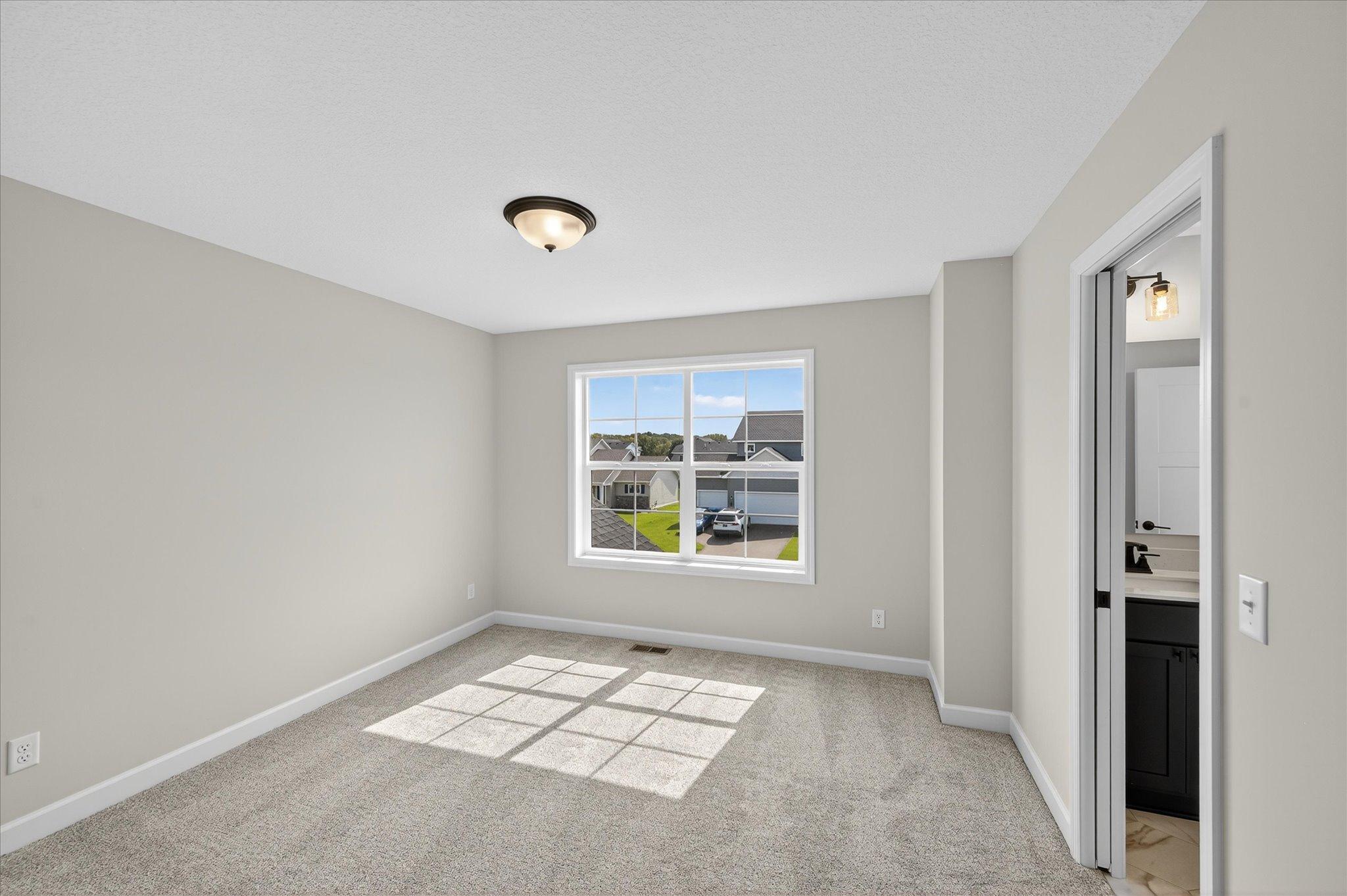 Bedroom - photo is of a previous inventory home. Inquire for more details and options.