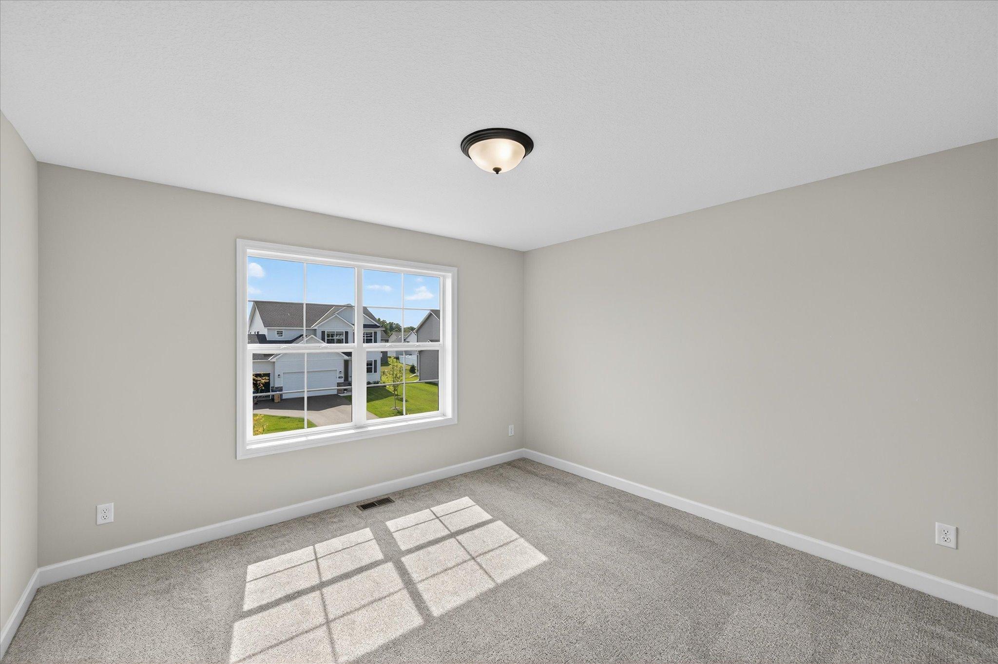 Bedroom - photo is of a previous inventory home. Inquire for more details and options.