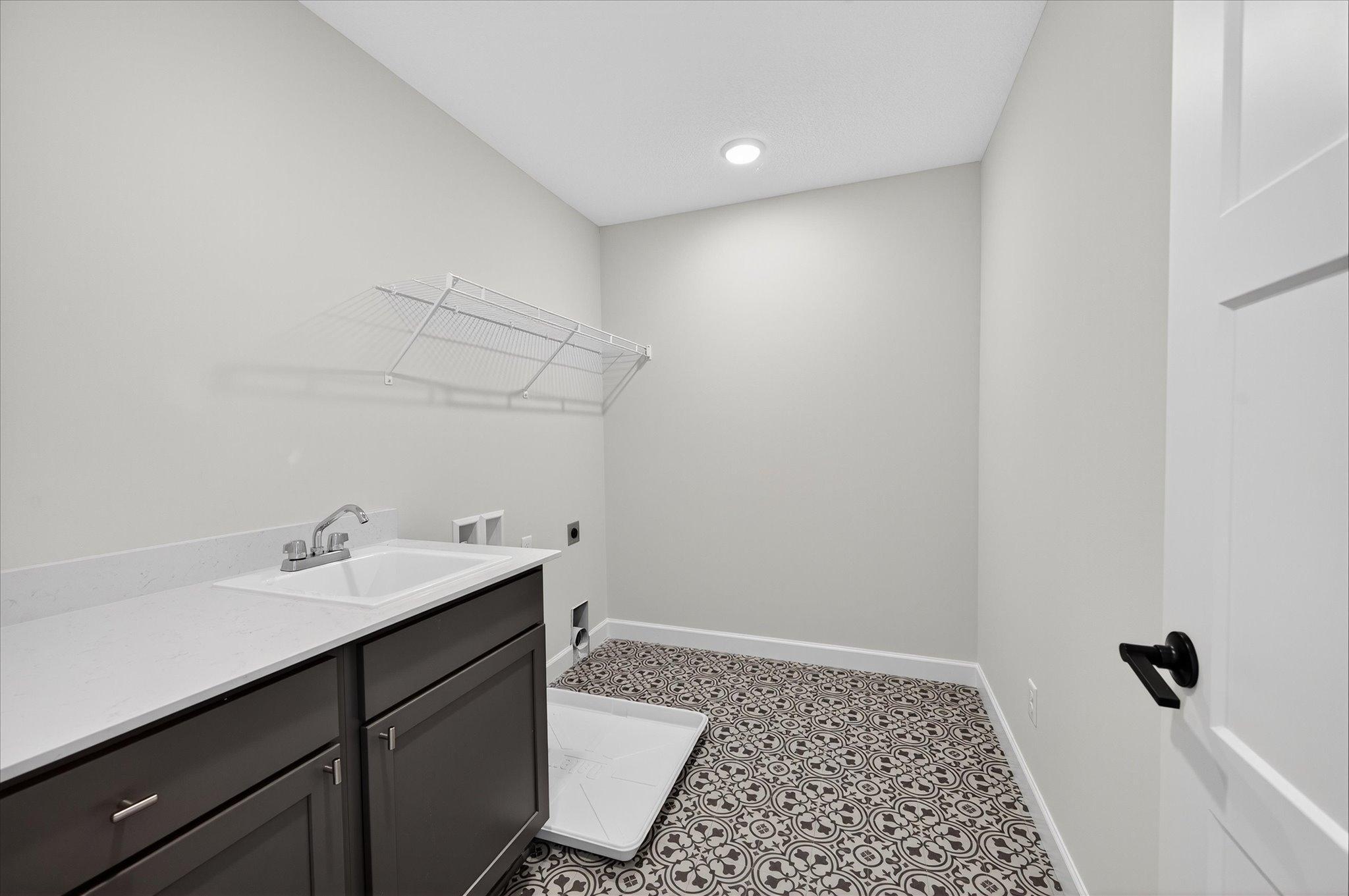 Laundry - photo is of a previous inventory home. Inquire for more details and options.
