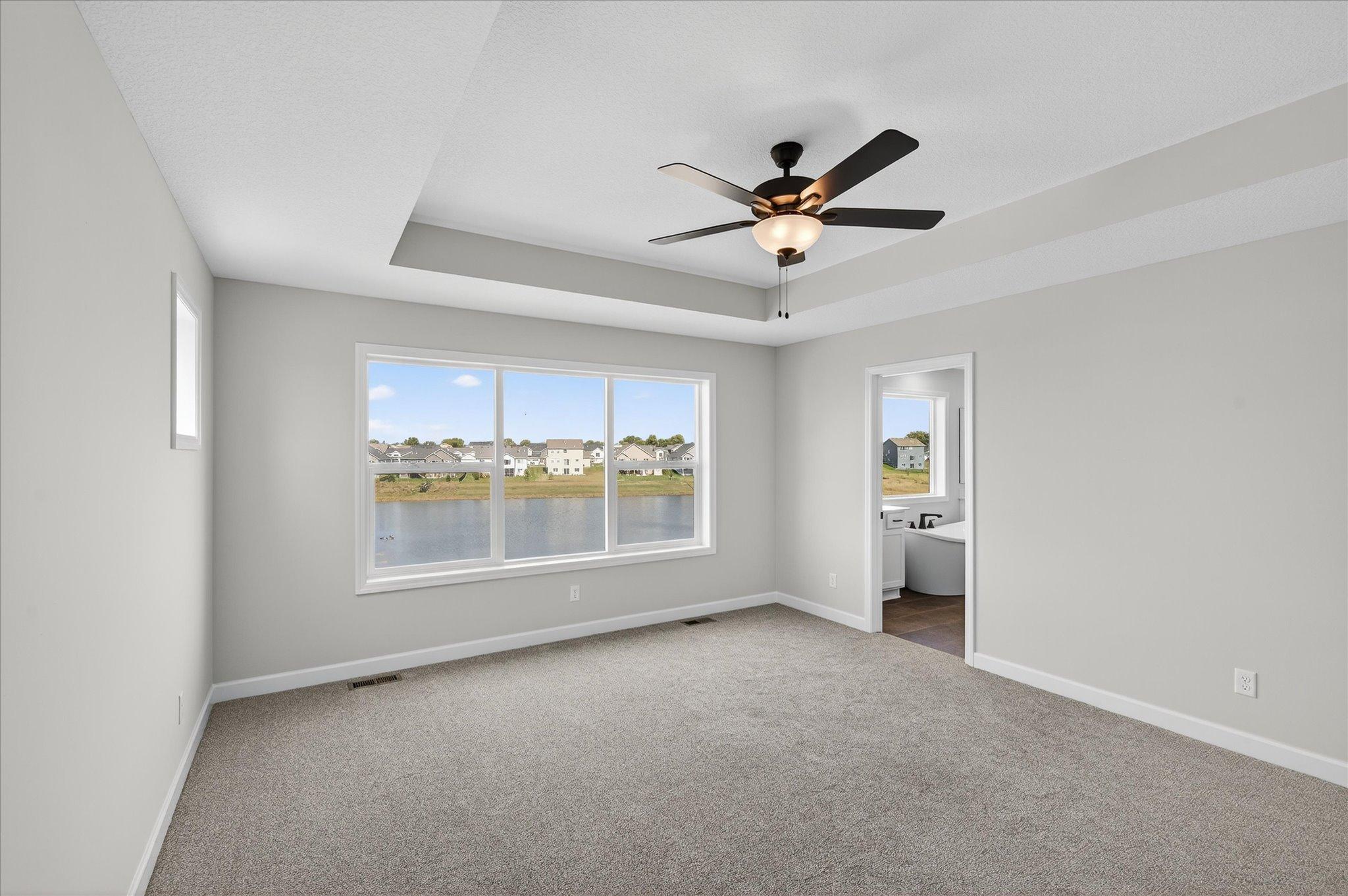 Primary Bedroom - photo is of a previous inventory home. Inquire for more details and options.
