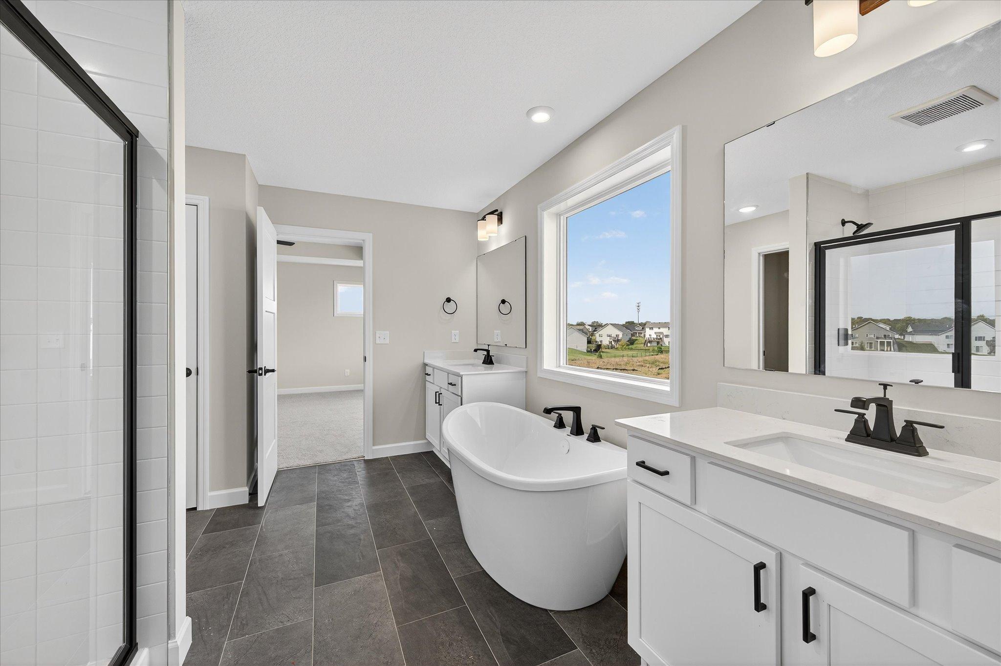 Primary Suite - photo is of a previous inventory home. Inquire for more details and options.