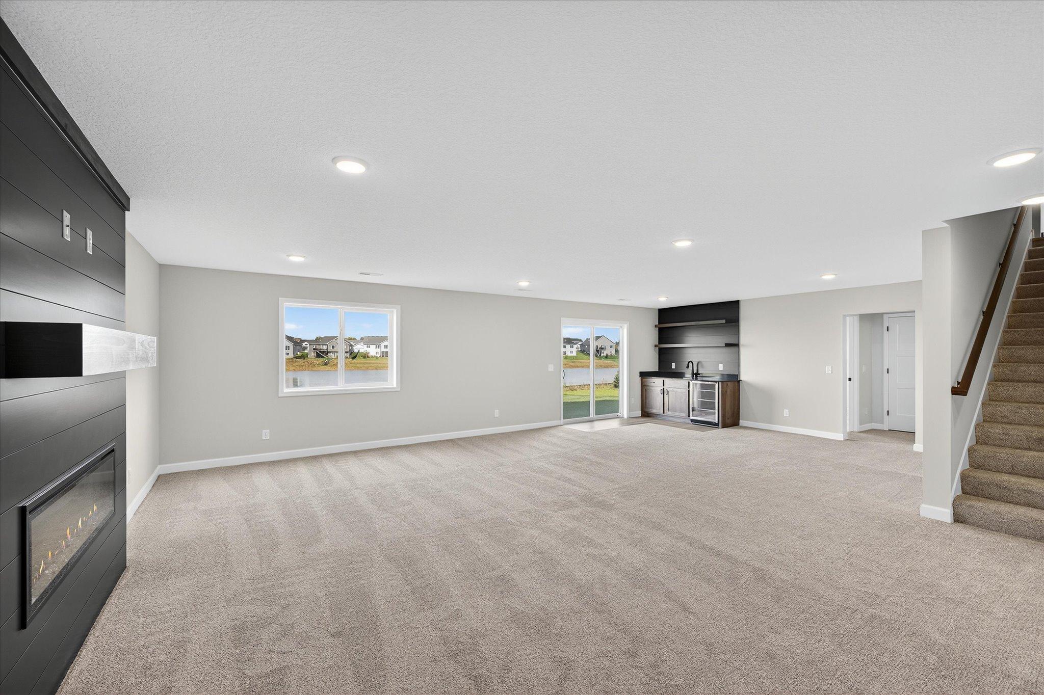 Finished Walkout Lower Level - photo is of a previous inventory home. Inquire for more details and options.