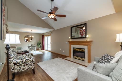 Living room with vautled ceilings and gas fireplace
