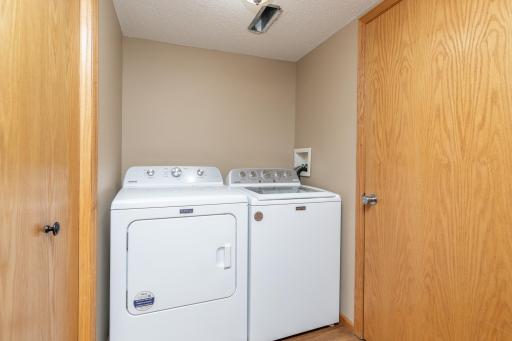 Main floor laundry with new washer dryer in 2024/2025
