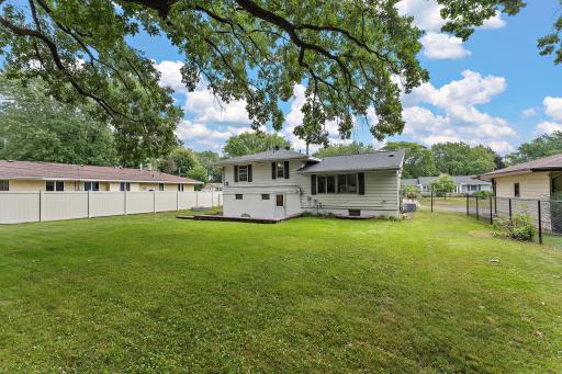 The backyard has mature trees and plenty of room for gardening or simply enjoying some privacy in a well-maintained greenscape. The yard also has an in-ground sprinkler system.
