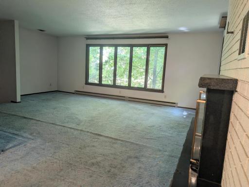 Living room. High ceilings. Picture window.