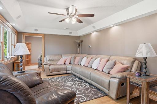 The impressive pan-vault ceiling adds volume and architectural character to this inviting living room.
