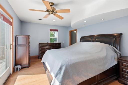 Designed for both comfort and functionality, the expansive primary bedroom offers plenty of room for a king-size bedroom set and additional seating.