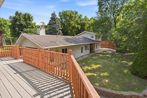 Step directly from the primary suite onto the spacious composite wraparound deck overlooking the private backyard. This elevated outdoor retreat is the perfect place to enjoy your morning coffee or unwind in the evening.