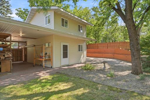 Detached two-story studio offers incredible flexibility with a private main-level office and an upper-level studio or gym.
