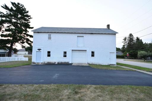 2400 sq ft garage with additional 1,500 sq ft loft & asphalt driveway