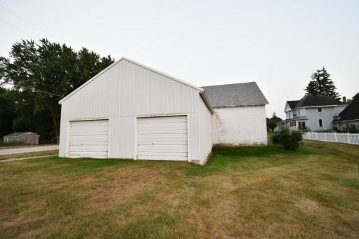 back side of the garage with 2 additional stalls