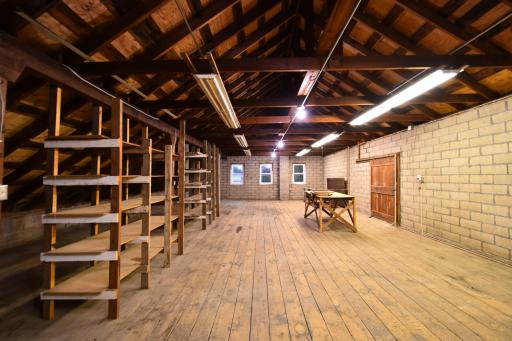 garage loft with shelving/storage