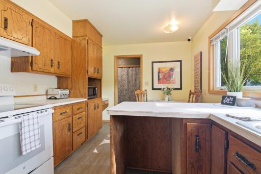 Prep and eatin Kitchen has Lots of Cupboard for storage.jpg