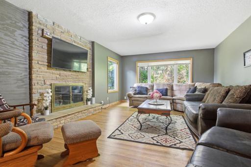 Community Living Room 2 Couches, love seat and 2 rocking chairs, foot rest, rug, table.jpg
