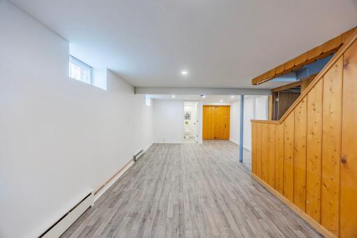 Discover endless possibilities in this newly renovated, basement, perfect for an entertainment hub, home bar, and gym.