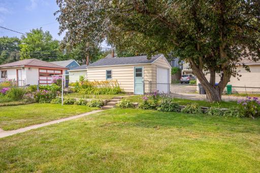 The garage includes a convenient side entry door and a massive driveway, perfect for satisfying extra parking.
