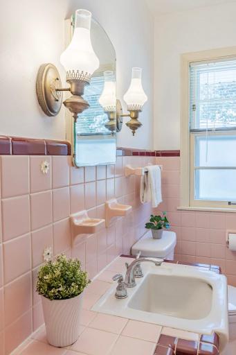Notice the beauty of authentic vintage bathroom light fixtures!