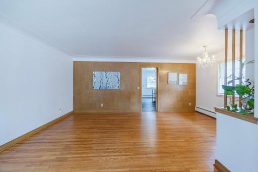Notice the authentic mid-century character as you enter this charming home!