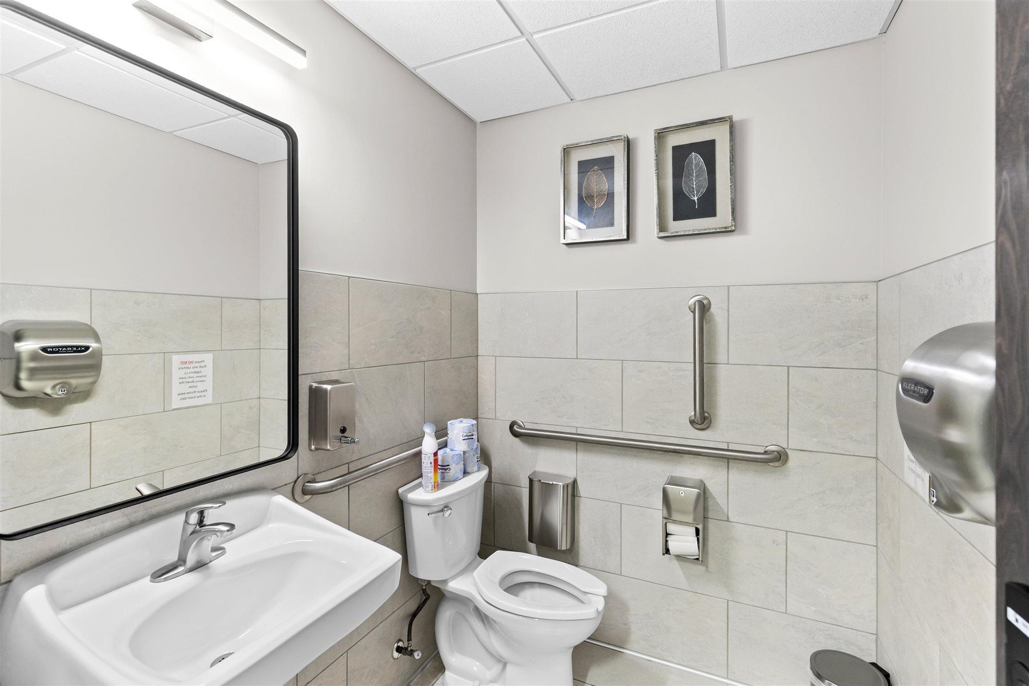 One of two unisex restrooms