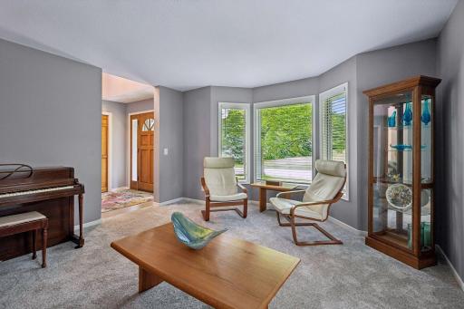 Large living room perfect for a quiet office or music room!