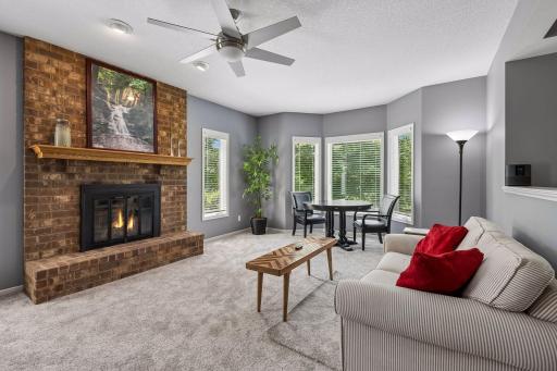Cozy fireplace, newer carpet, great natural light!