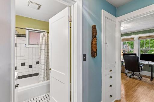 The main level features a hallway with two linen closets.