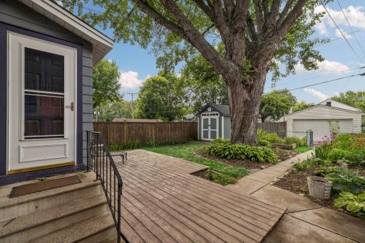 A garden shed for extra storage sits at the back of the lot.