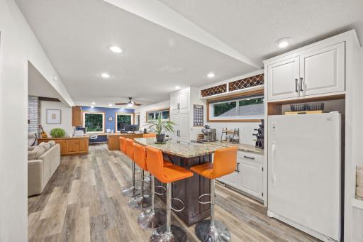 View from the flex space to the bar, family room and office space.