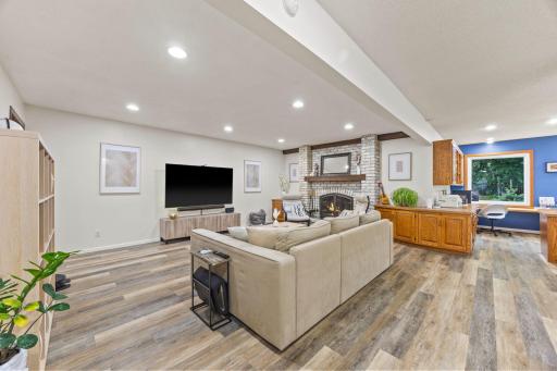 Cozy family room with updated wood burning fireplace - in working order.