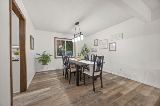 The dining room is large enough for holiday gatherings and small enough for cozy every day meals.